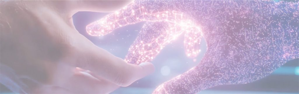 A human hand gently touching a glowing, digital hand composed of light particles, symbolising interaction between humans and artificial intelligence.